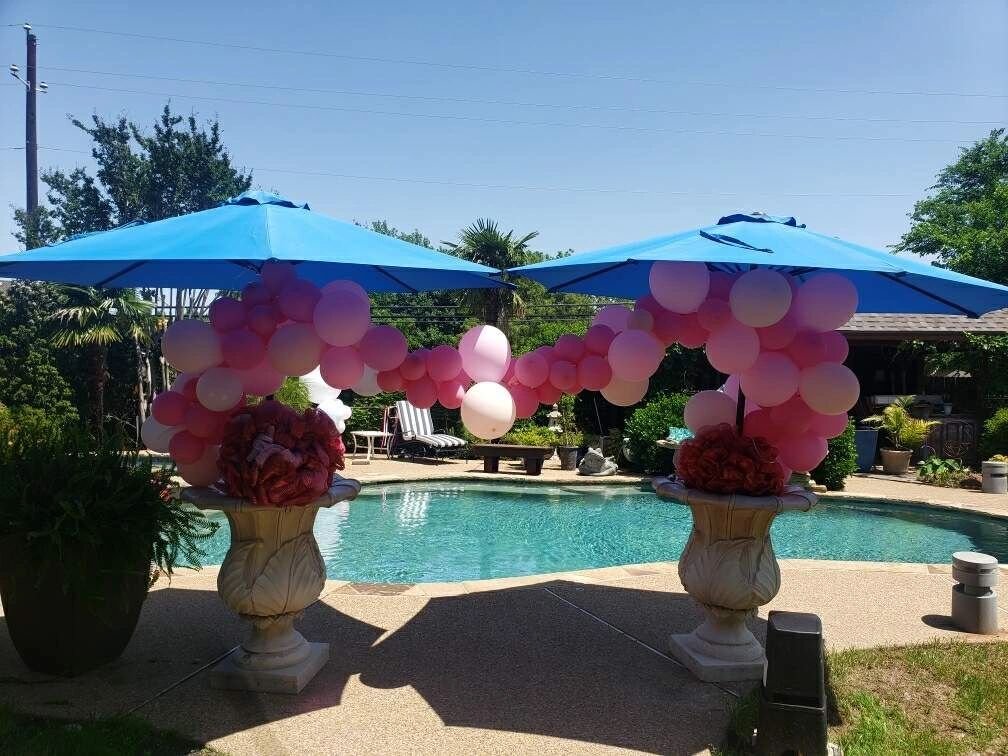 Poolside balloon installation for a private event